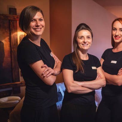 Portrait of confident female expert massage therapists